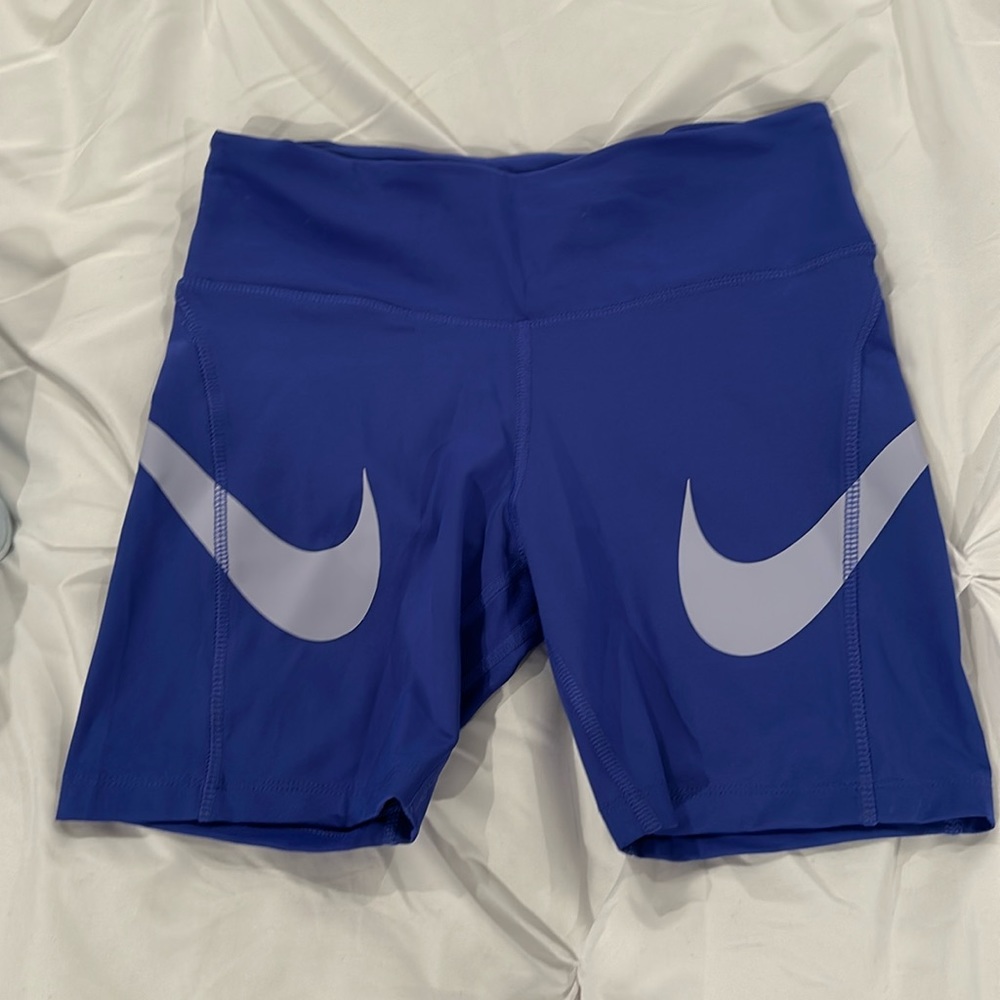 Nike Fast DRI-FIT Women’s Double Barreled Swoosh Mid Rise Compression Shorts